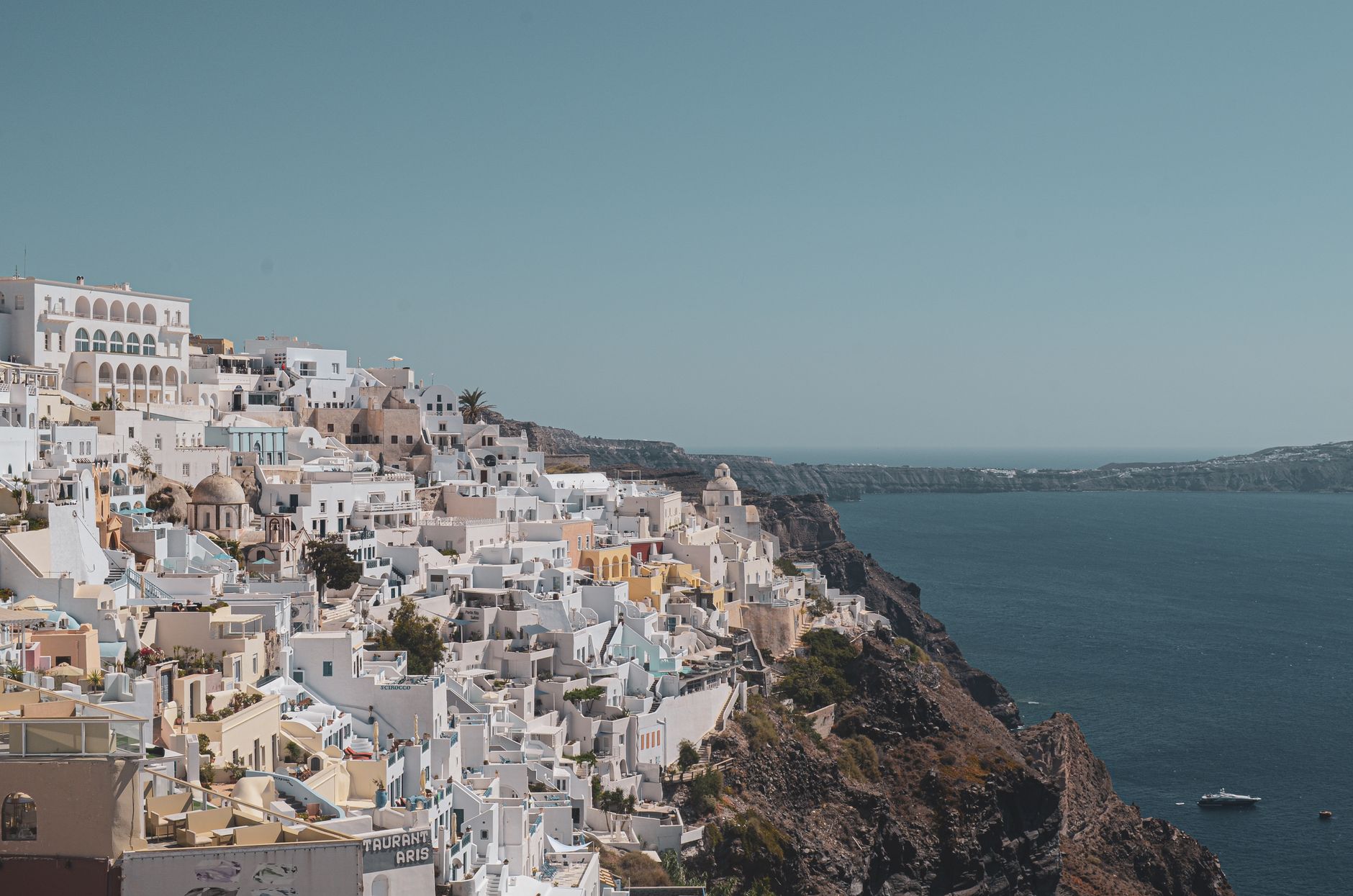 Sun-drenched Aegean sea view with whitewashed terrace